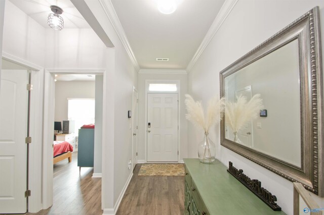 14267 Leadenhall Ln, Athens, AL 35613 - foyer entrance with wood finished floors, crown molding, and baseboards