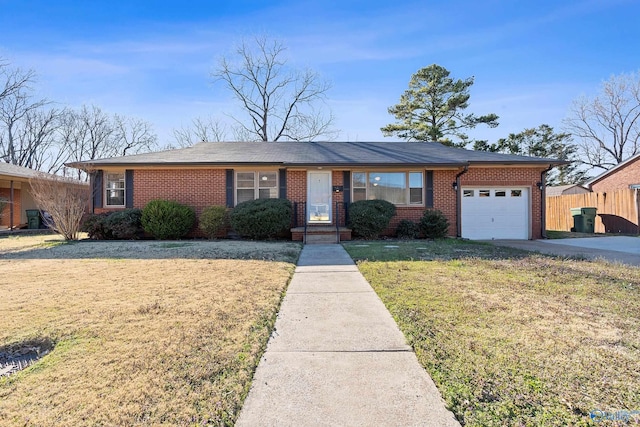 ranch-style house with driveway, fence, an attached garage, a front yard, and brick siding