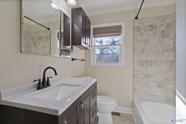 bathroom featuring visible vents, baseboards, toilet, bathing tub / shower combination, and vanity