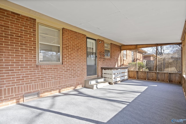 view of patio / terrace featuring visible vents