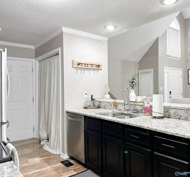 108 Mountain Home Rd, Trinity, AL 35673 - bar featuring appliances with stainless steel finishes, a sink, light wood finished floors, a textured ceiling, and crown molding