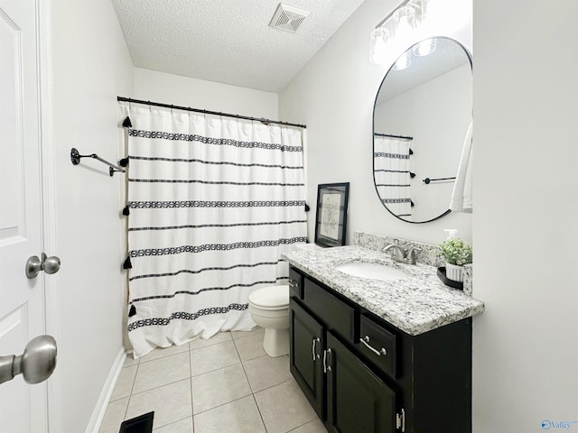 108 Mountain Home Rd, Trinity, AL 35673 - bathroom with tile patterned floors, a textured ceiling, toilet, vanity, and a shower with shower curtain
