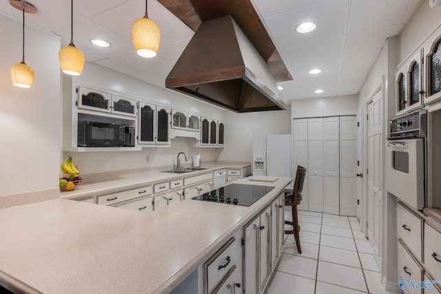 kitchen with light tile patterned flooring, black appliances, pendant lighting, island exhaust hood, and sink