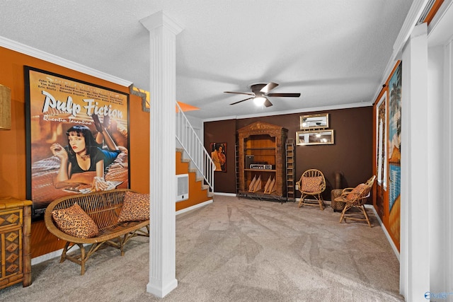 102 Fern Cv, Florence, AL 35634 - sitting room with a ceiling fan, ornamental molding, carpet floors, ornate columns, and baseboards