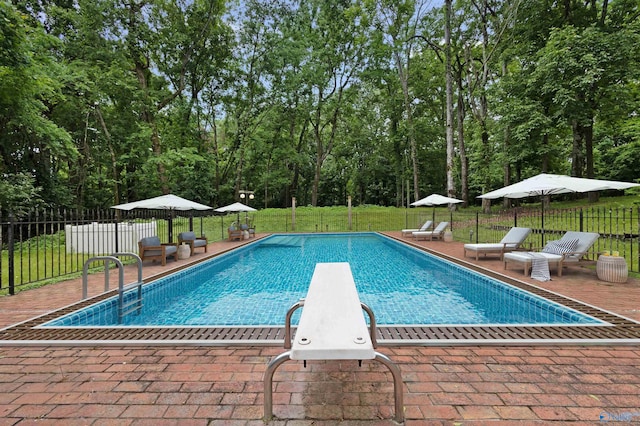 102 Fern Cv, Florence, AL 35634 - view of swimming pool featuring a patio area and a diving board