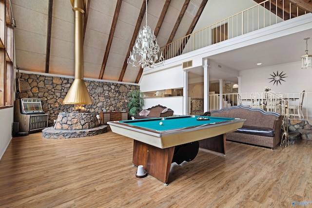 102 Fern Cv, Florence, AL 35634 - rec room featuring wood finished floors, beamed ceiling, high vaulted ceiling, billiards, and a chandelier