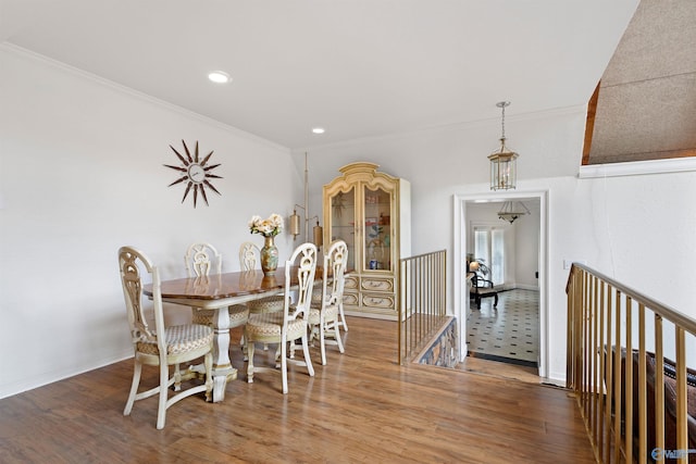 102 Fern Cv, Florence, AL 35634 - dining space featuring ornamental molding, wood finished floors, and recessed lighting