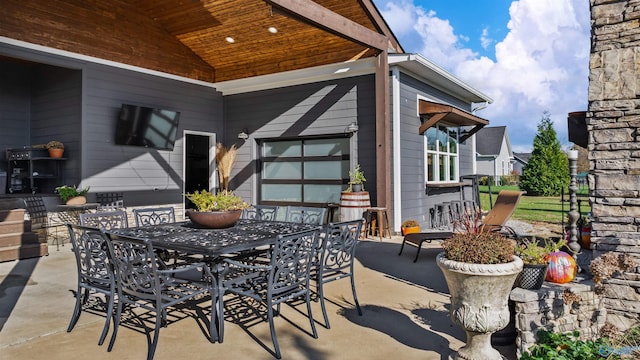 view of patio / terrace featuring an outdoor bar