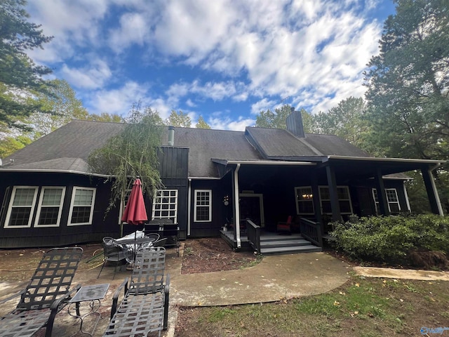 back of property featuring a patio area