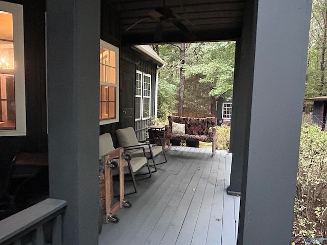 deck featuring ceiling fan and covered porch