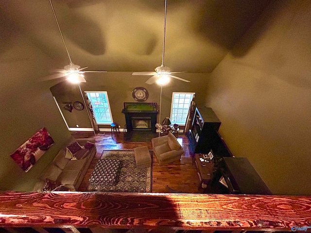 living room featuring high vaulted ceiling