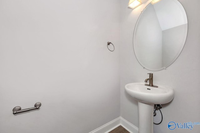 bathroom featuring hardwood / wood-style flooring