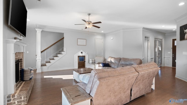 110 Ginamey Cir, Meridianville, AL 35759 - living room with ceiling fan, a brick fireplace, recessed lighting, dark wood-style flooring, and stairs