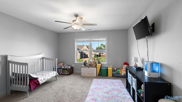 110 Ginamey Cir, Meridianville, AL 35759 - bedroom featuring carpet floors, ceiling fan, and a crib