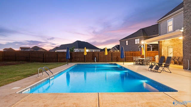 110 Ginamey Cir, Meridianville, AL 35759 - pool at dusk with a fenced backyard and a patio