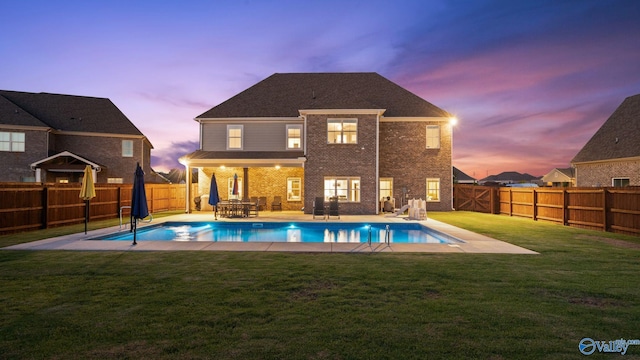 110 Ginamey Cir, Meridianville, AL 35759 - back of house featuring a fenced backyard, a patio area, and brick siding