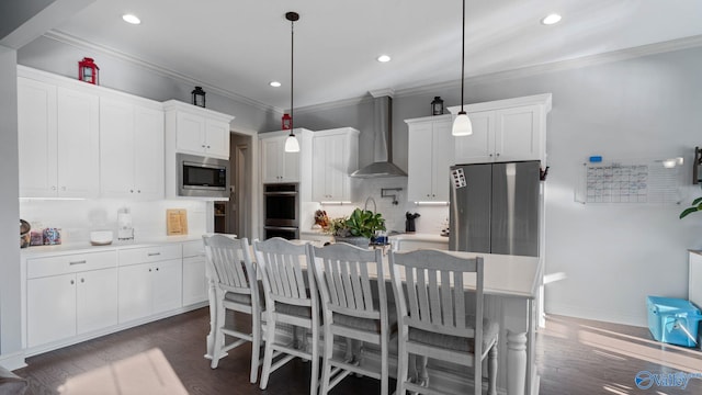 110 Ginamey Cir, Meridianville, AL 35759 - kitchen with wall chimney exhaust hood, stainless steel appliances, ornamental molding, backsplash, and white cabinets