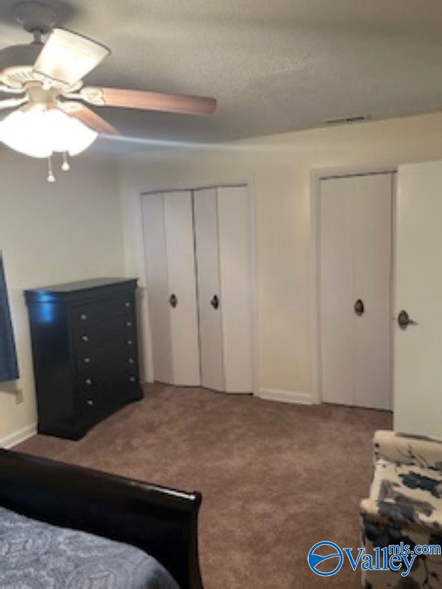 bedroom featuring carpet floors and ceiling fan