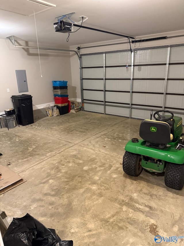 garage with electric panel and a garage door opener