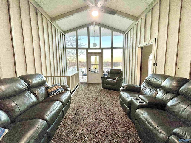 living room with high vaulted ceiling, ceiling fan, carpet floors, french doors, and beam ceiling