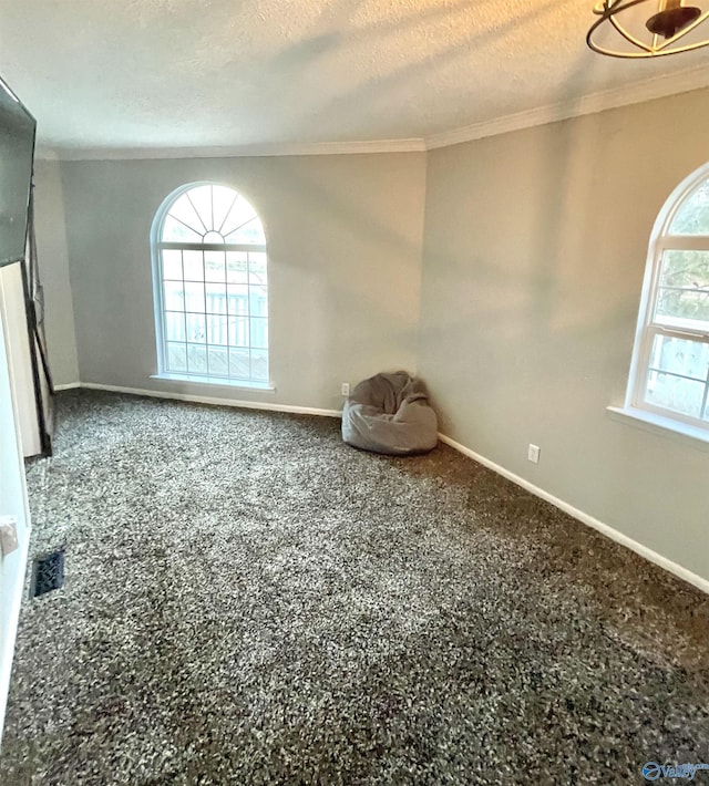 unfurnished room featuring baseboards and ornamental molding
