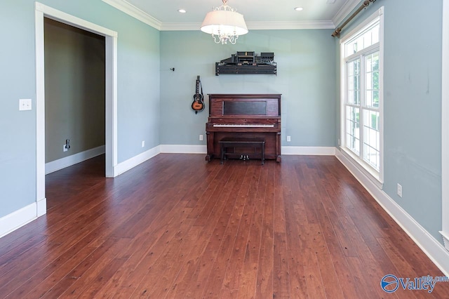 interior space with dark wood-type flooring, ornamental molding, and a chandelier