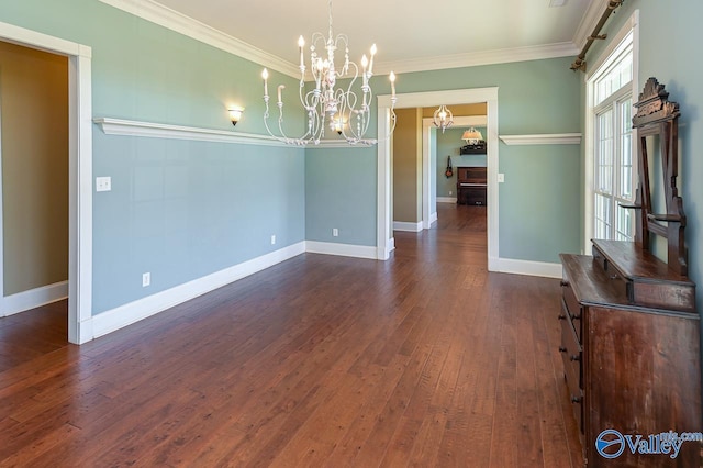 unfurnished dining area featuring dark hardwood / wood-style flooring, a notable chandelier, and ornamental molding