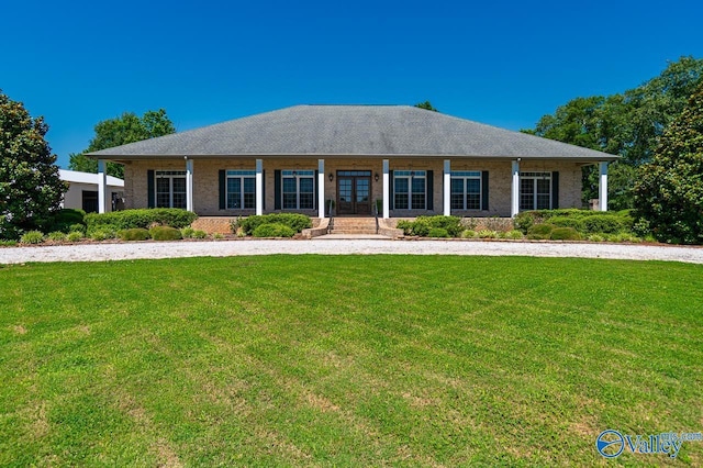 ranch-style house featuring a front lawn