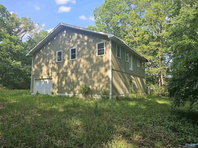26095 Children Ln, Athens, AL 35613 - view of side of home featuring an attached garage