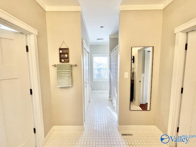 corridor with crown molding