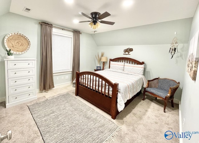 carpeted bedroom featuring ceiling fan and lofted ceiling