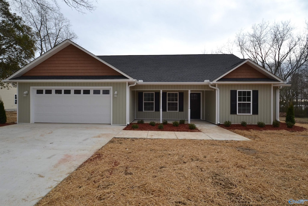 ranch-style home with a garage