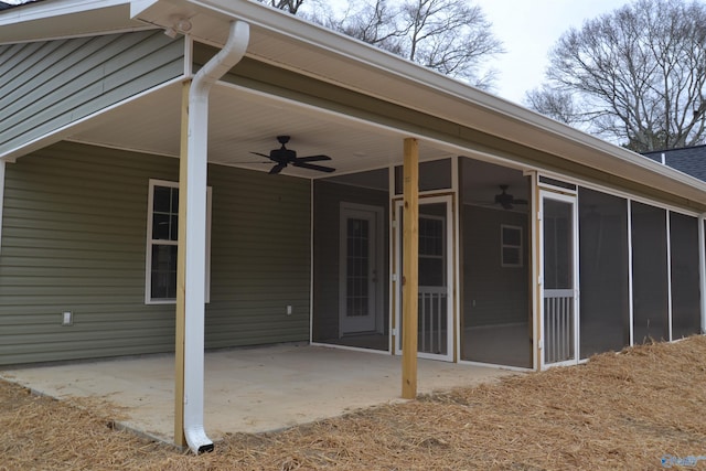 exterior space featuring a sunroom and ceiling fan