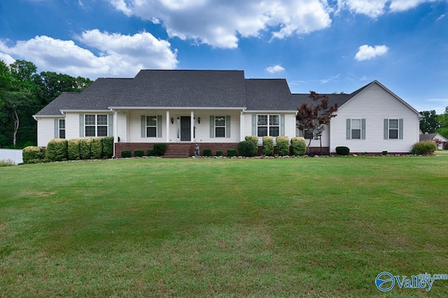 single story home with a porch and a front lawn