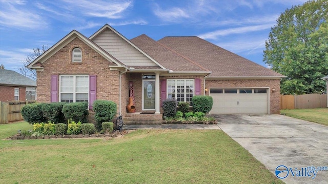 view of front of home featuring a front lawn and a garage