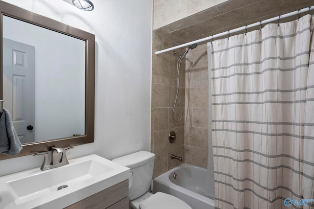 bathroom featuring toilet, vanity, and shower / bath combination with curtain