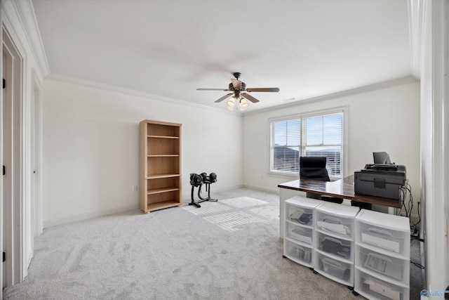 carpeted office with ornamental molding and ceiling fan