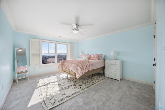 bedroom with crown molding, light colored carpet, and ceiling fan