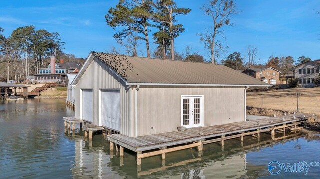 exterior space featuring central AC, a water view, and ceiling fan