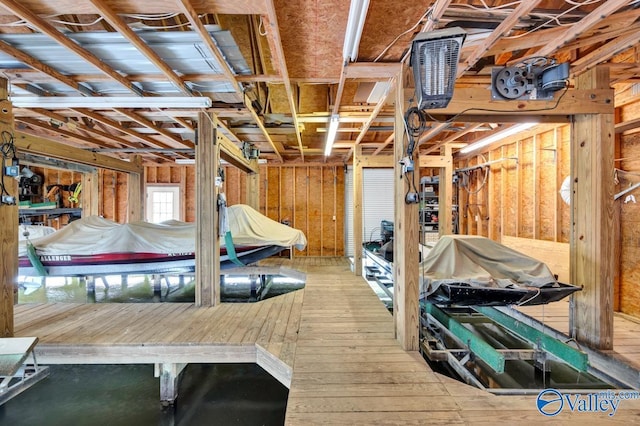 basement featuring wood-type flooring