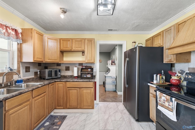 kitchen with marble finish floor, stainless steel appliances, crown molding, premium range hood, and a sink