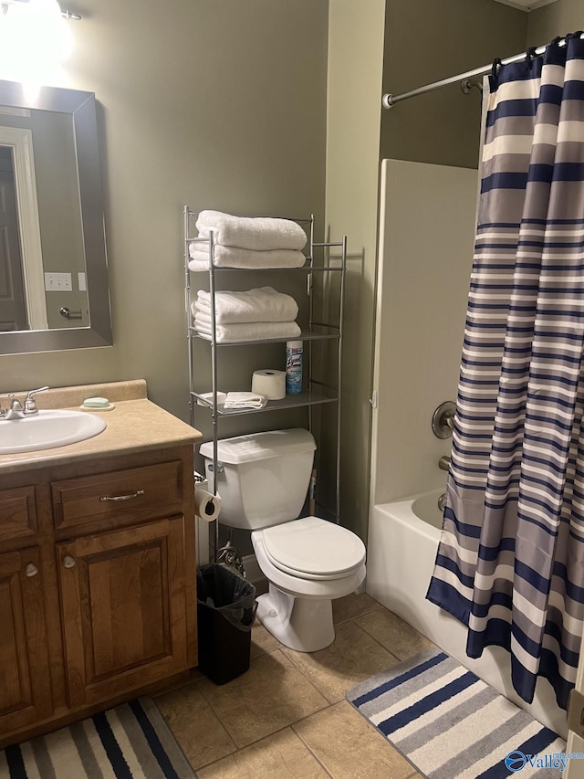 full bathroom featuring shower / tub combo with curtain, vanity, toilet, and tile patterned floors