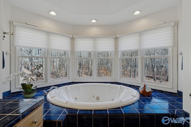 bathroom with tiled tub