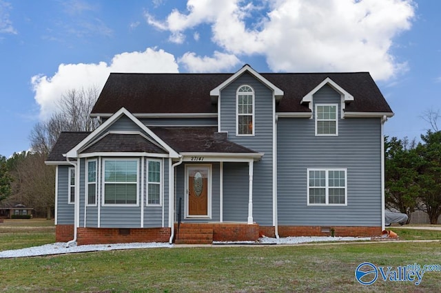 view of front of house with a front lawn