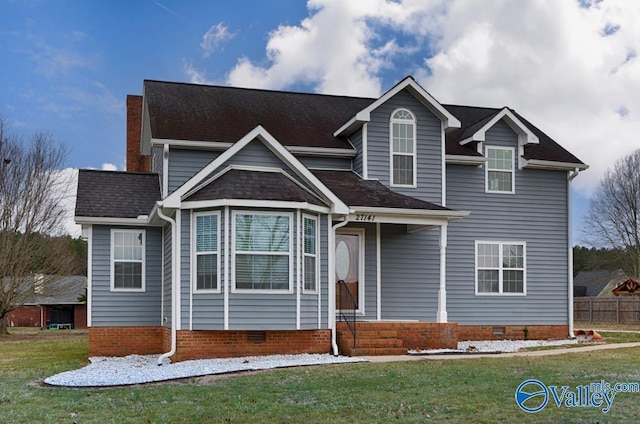 view of front of property with a front yard