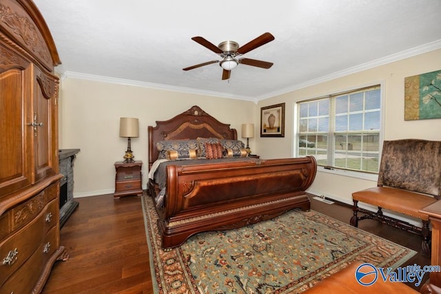 bedroom with crown molding, ceiling fan, and dark hardwood / wood-style floors