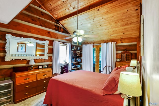 bedroom featuring ceiling fan, vaulted ceiling, carpet, and wooden ceiling