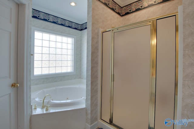 full bathroom featuring a shower stall and a whirlpool tub