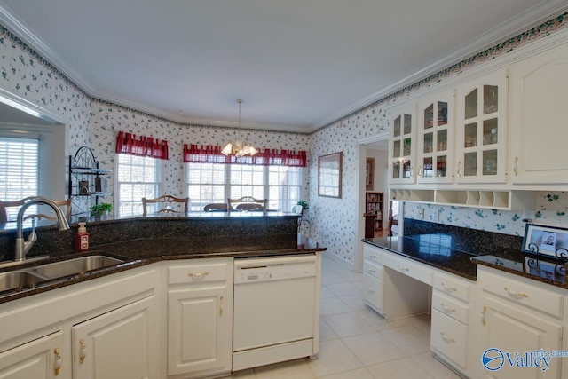 kitchen with wallpapered walls, crown molding, dishwasher, and a sink