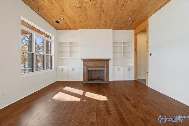 unfurnished living room featuring built in shelves, dark hardwood / wood-style flooring, and wood ceiling